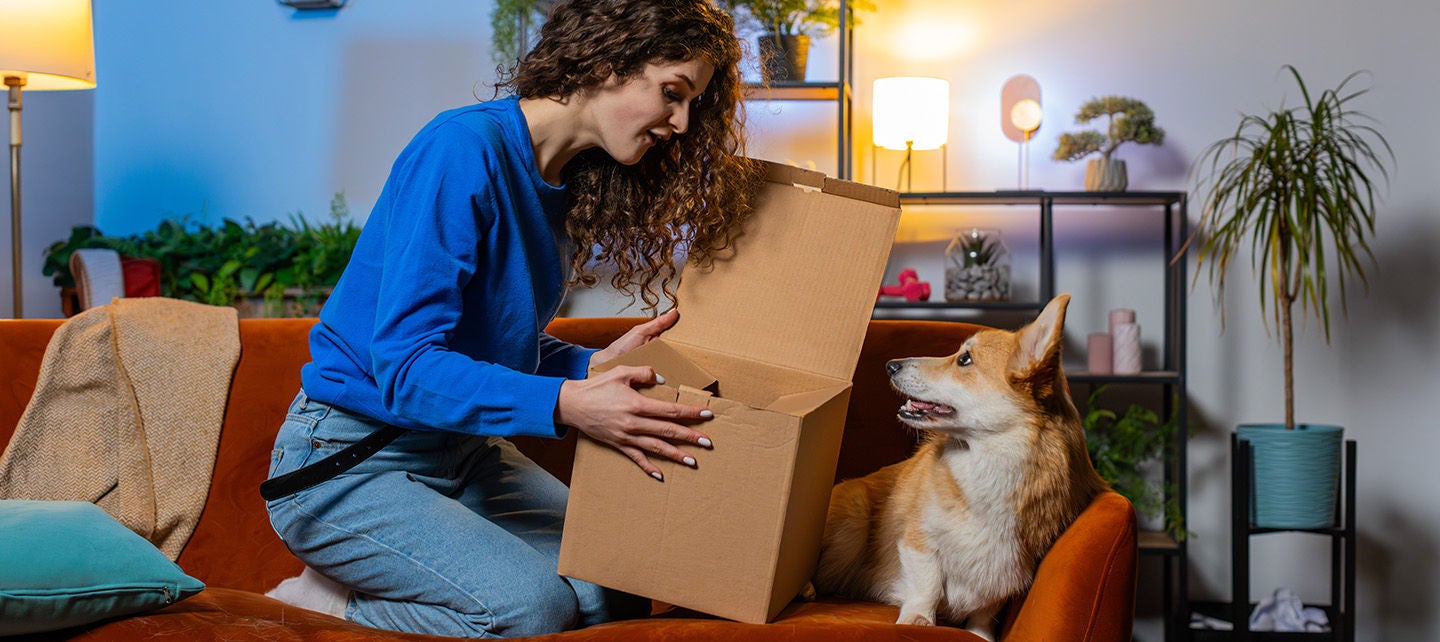 Woman on the couch with her dog