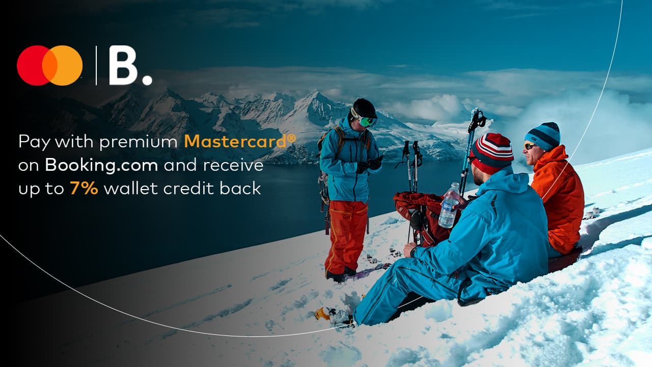 skiers resting on snowy mountain