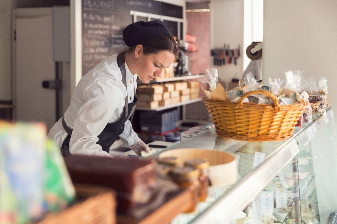 Woman working in pastry shop