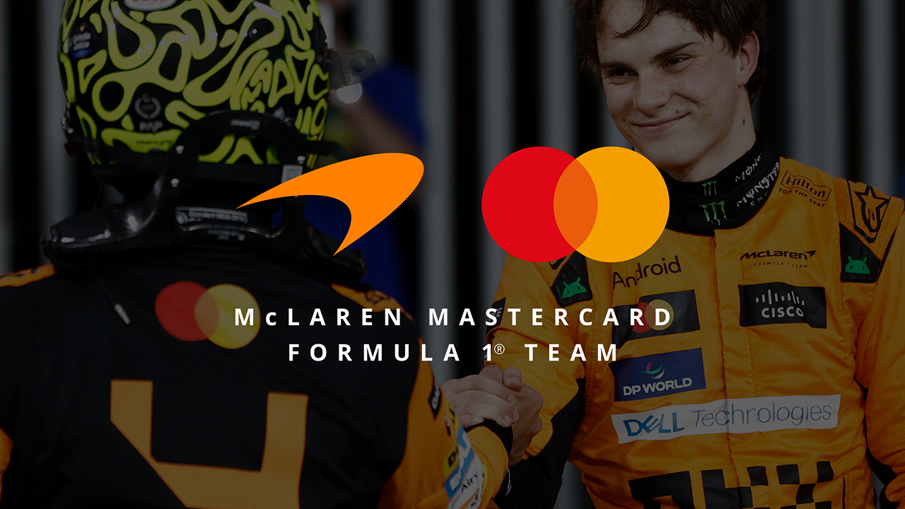 Image of 2 racers shaking hands with an overlay of the McLaren and Mastercard logo on top
