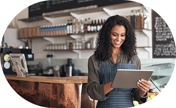 Woman looking at tablet in retail store