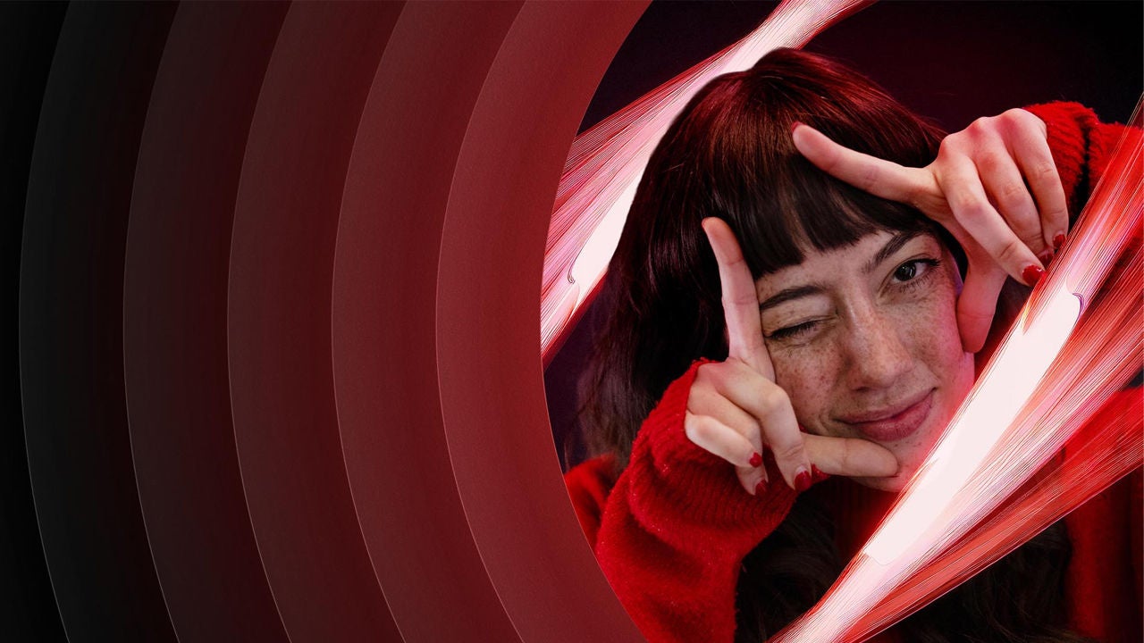 A woman posing with her hand on her face