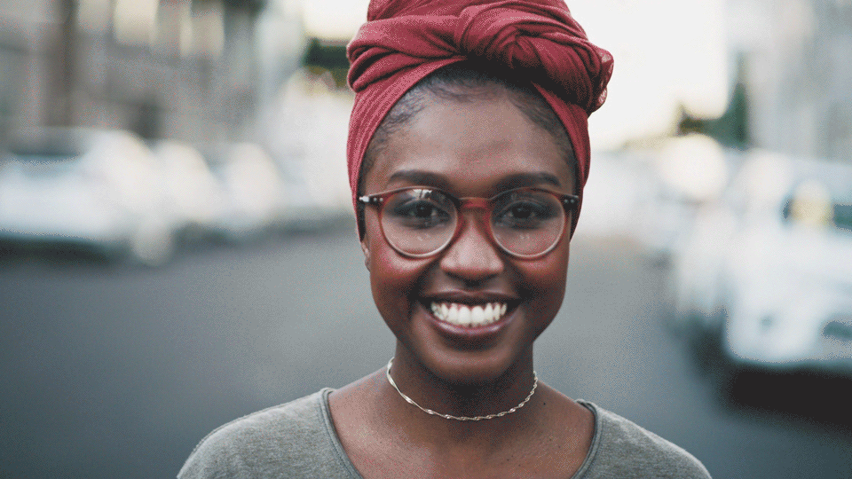 Woman smiling.