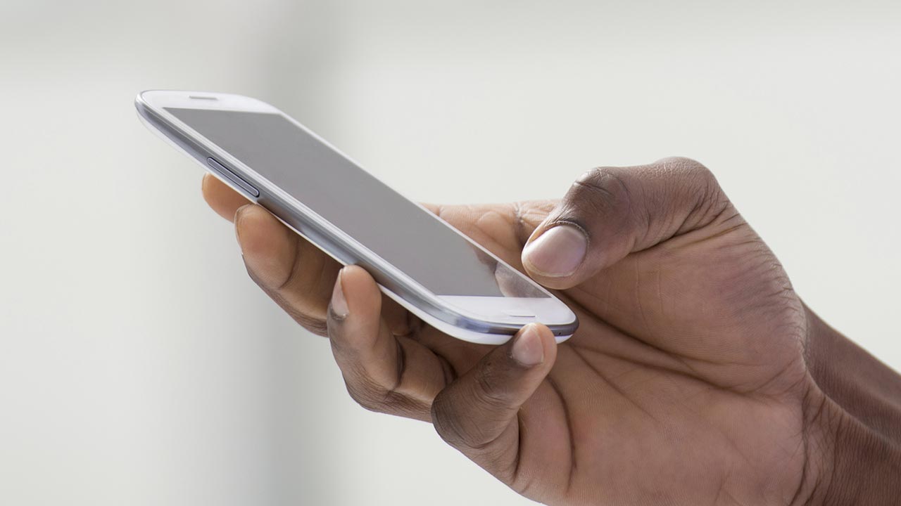 Close up phone in hand