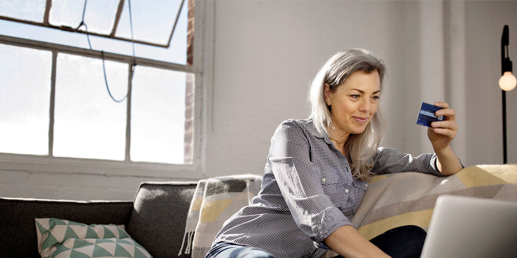 Woman making online purchase