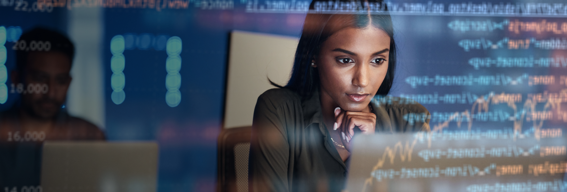 Woman working to prevent cyber attacks.