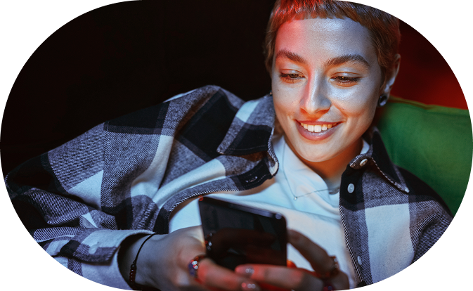 Smiling woman on her phone