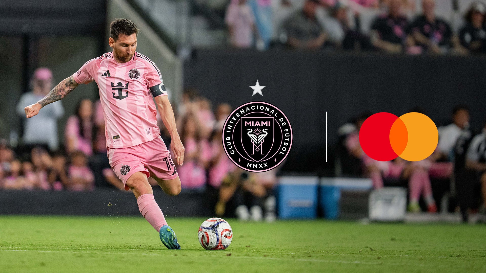 Lionel Messi playing football, with logos for Mastercard and Inter Miami CF to his right