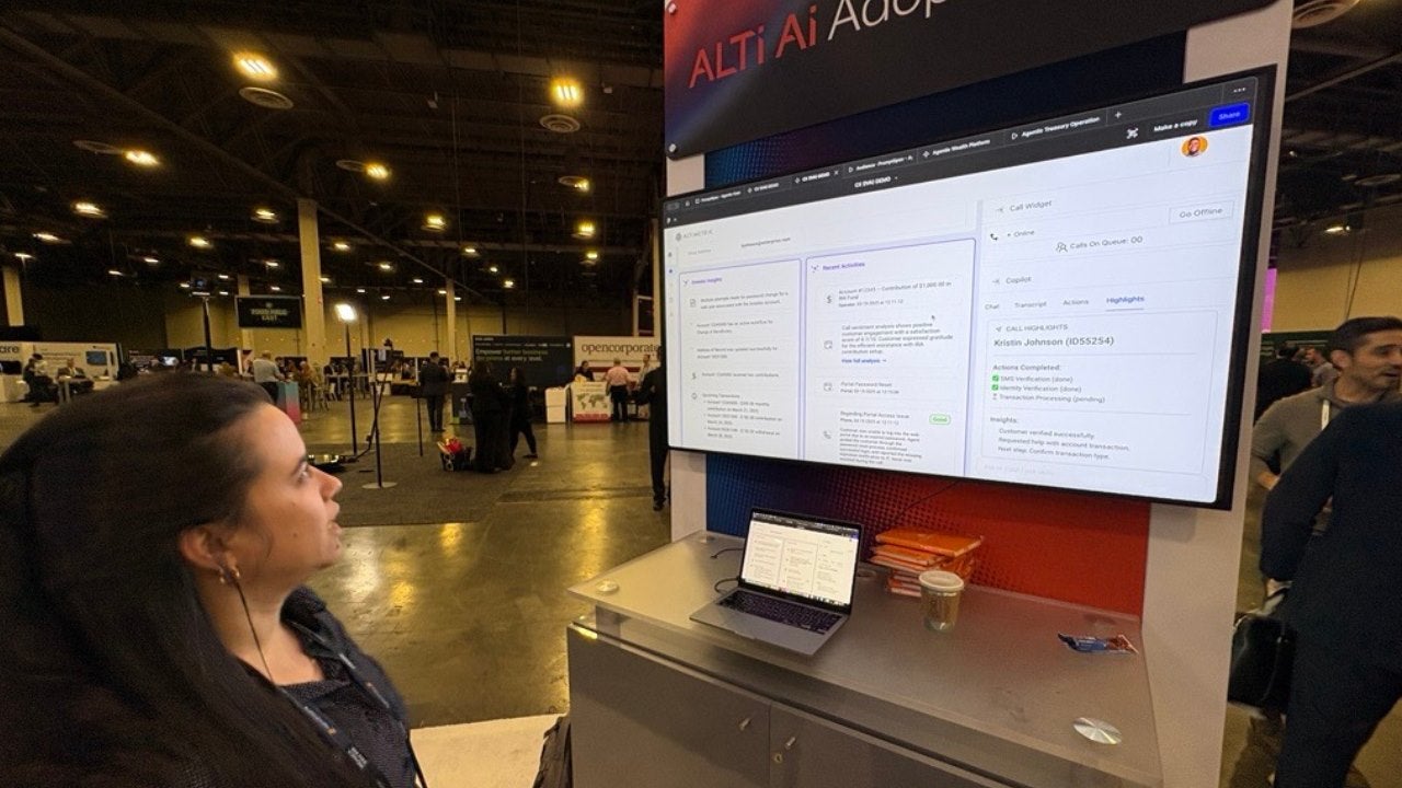Lisandra Gonzalez, who leads web and mobile teams at software developer Altimetri at her company’s booth.