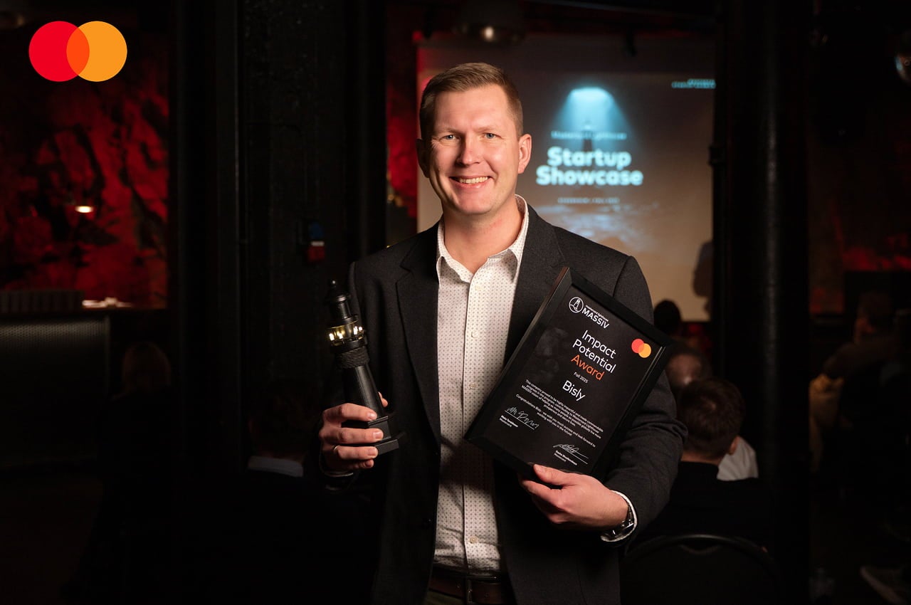 startup showcase winner with award certificate