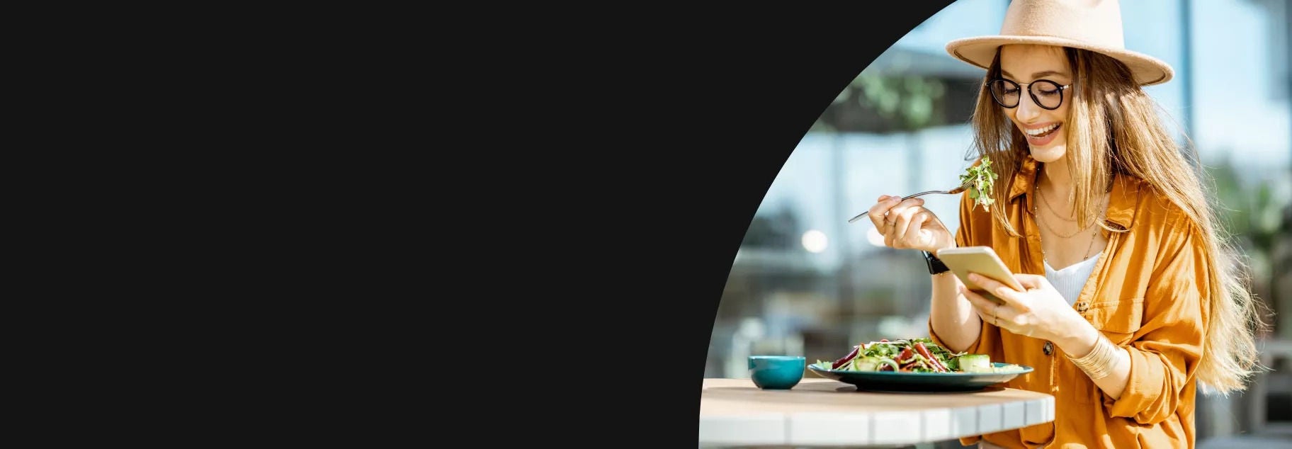 Woman smiling eating lunch