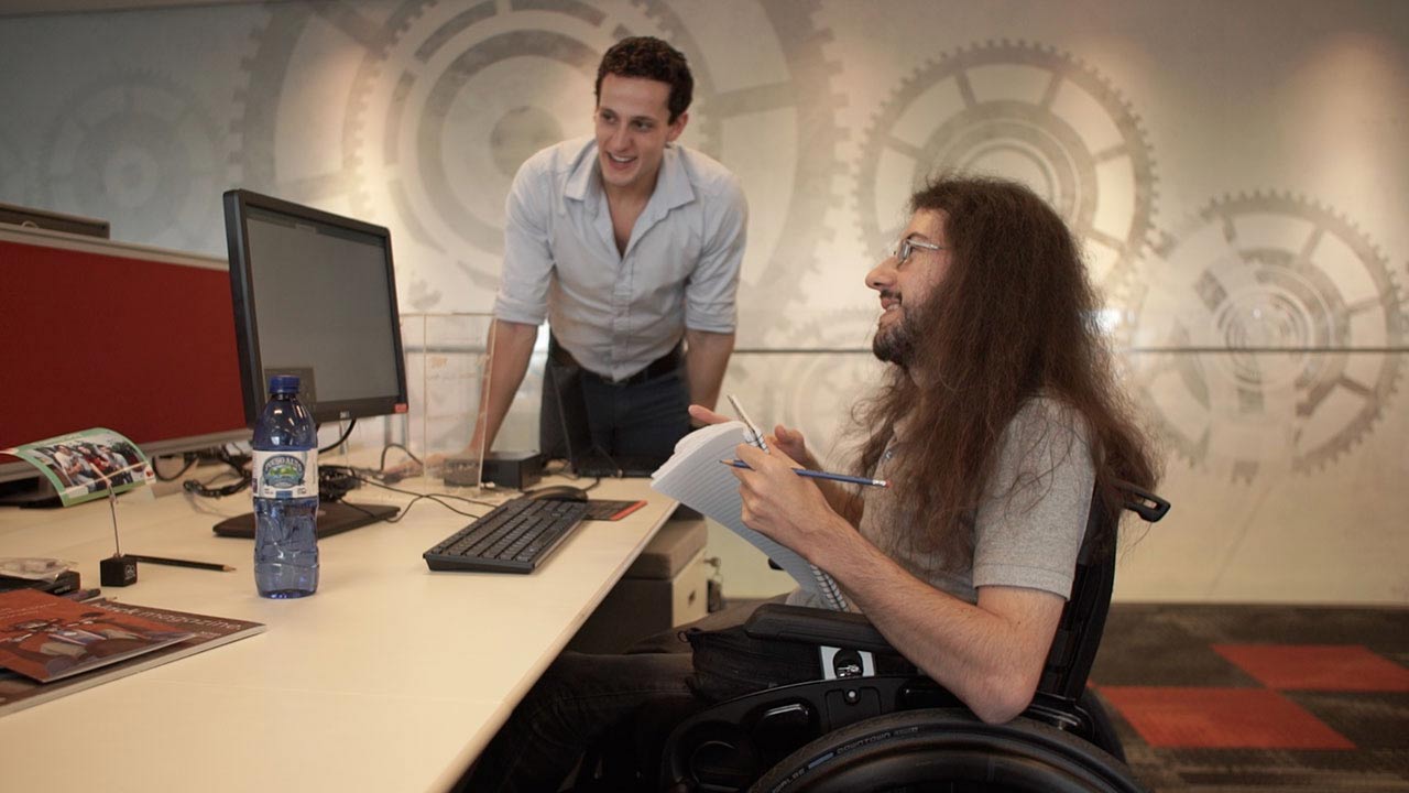 Two man working at desk