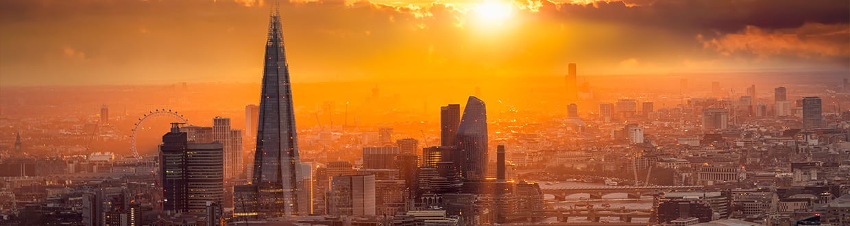 sunset behind london skyline