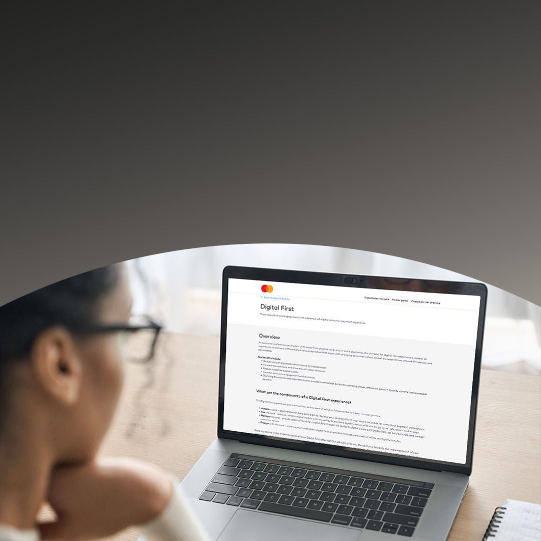 a woman viewing digital first document on her laptop screen.