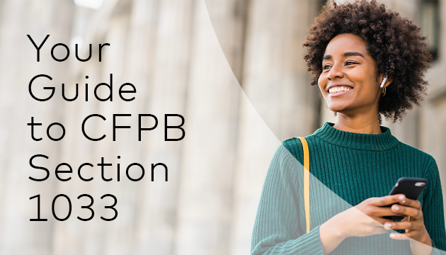 Woman smiling with phone in hand