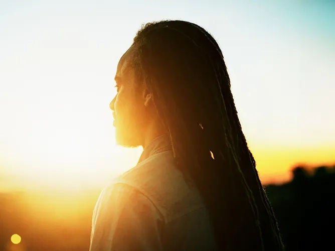 A person looking out in the distance.