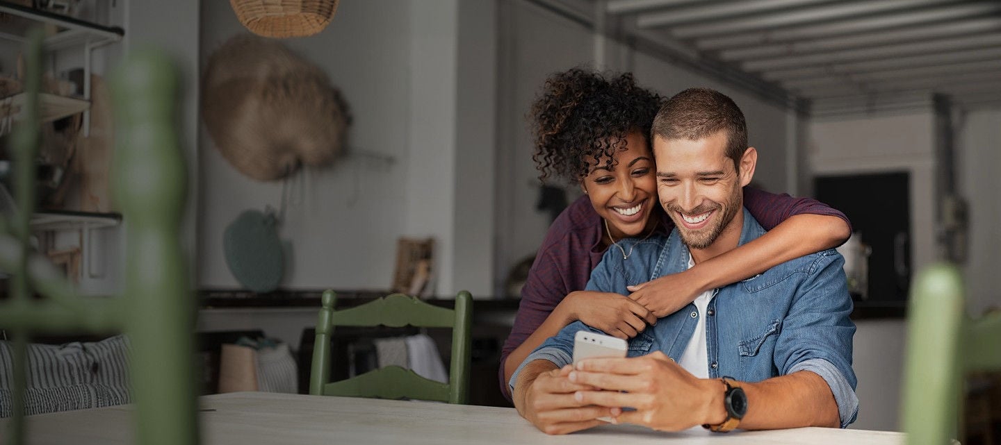  A man and woman sitting at a table