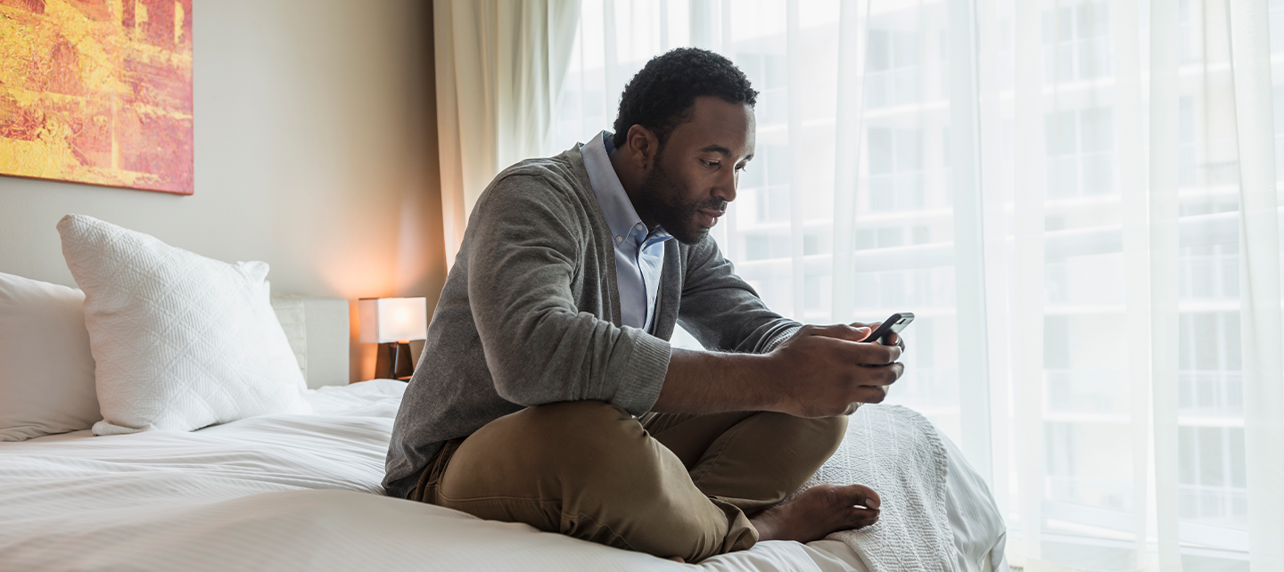 Man checking emails on his phone