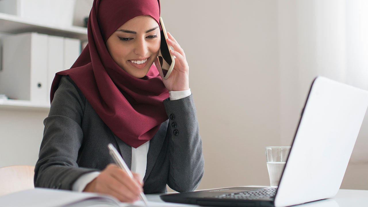 Businesswoman working at her office.