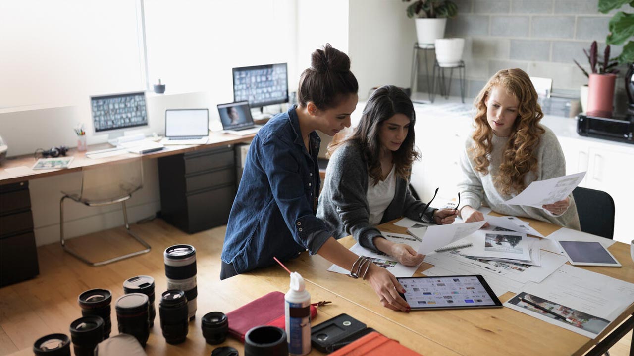 Female colleagues working together.