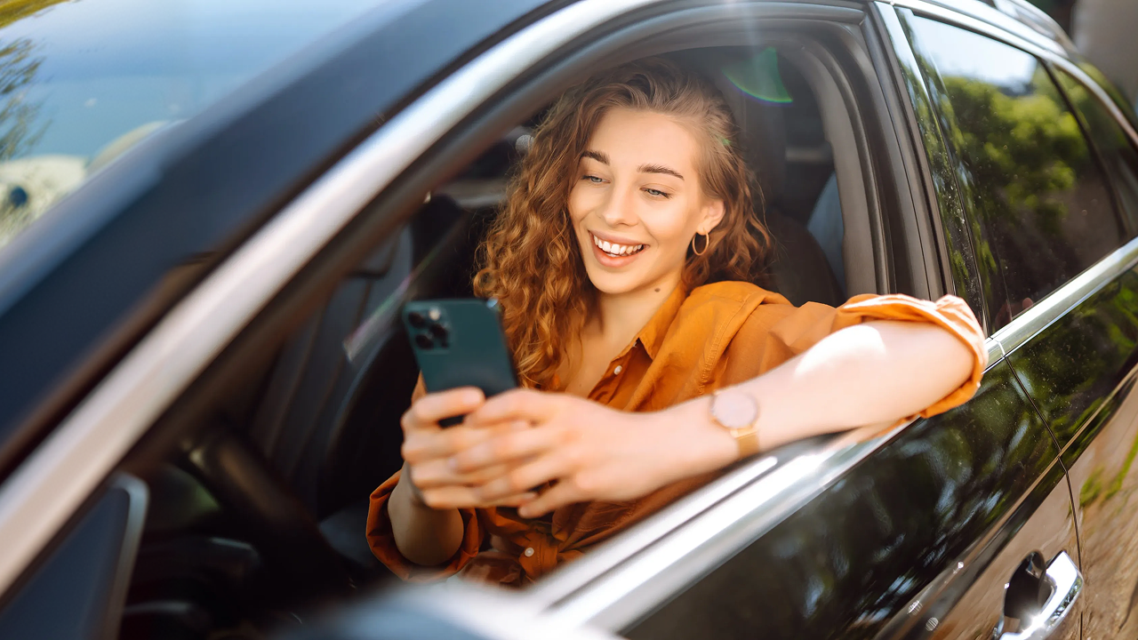 Woman in car on the phone