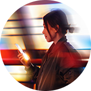 woman smiling while shopping and looking at her phone