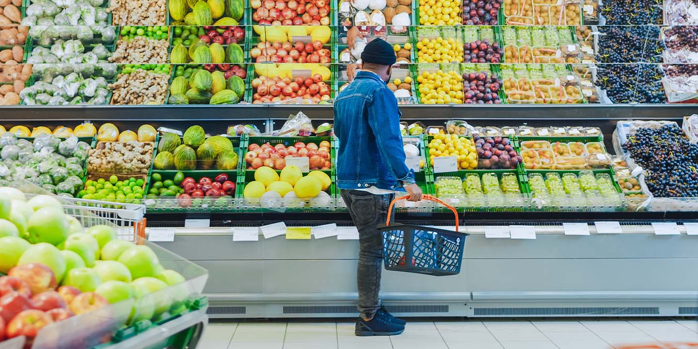 A man grocery shopping