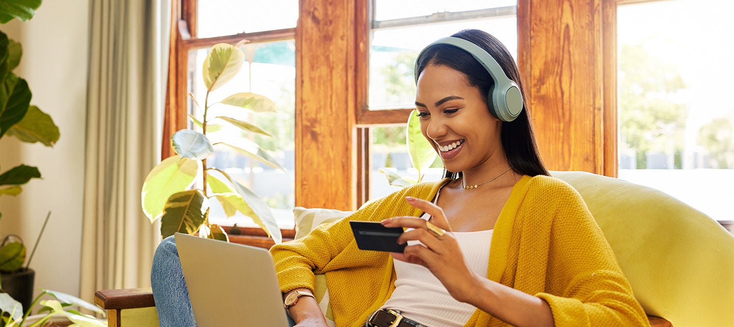 Mother and child looking at laptop.