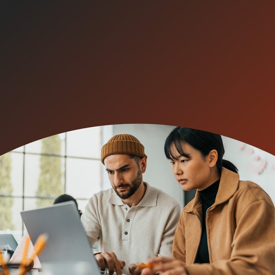 man and woman with laptop