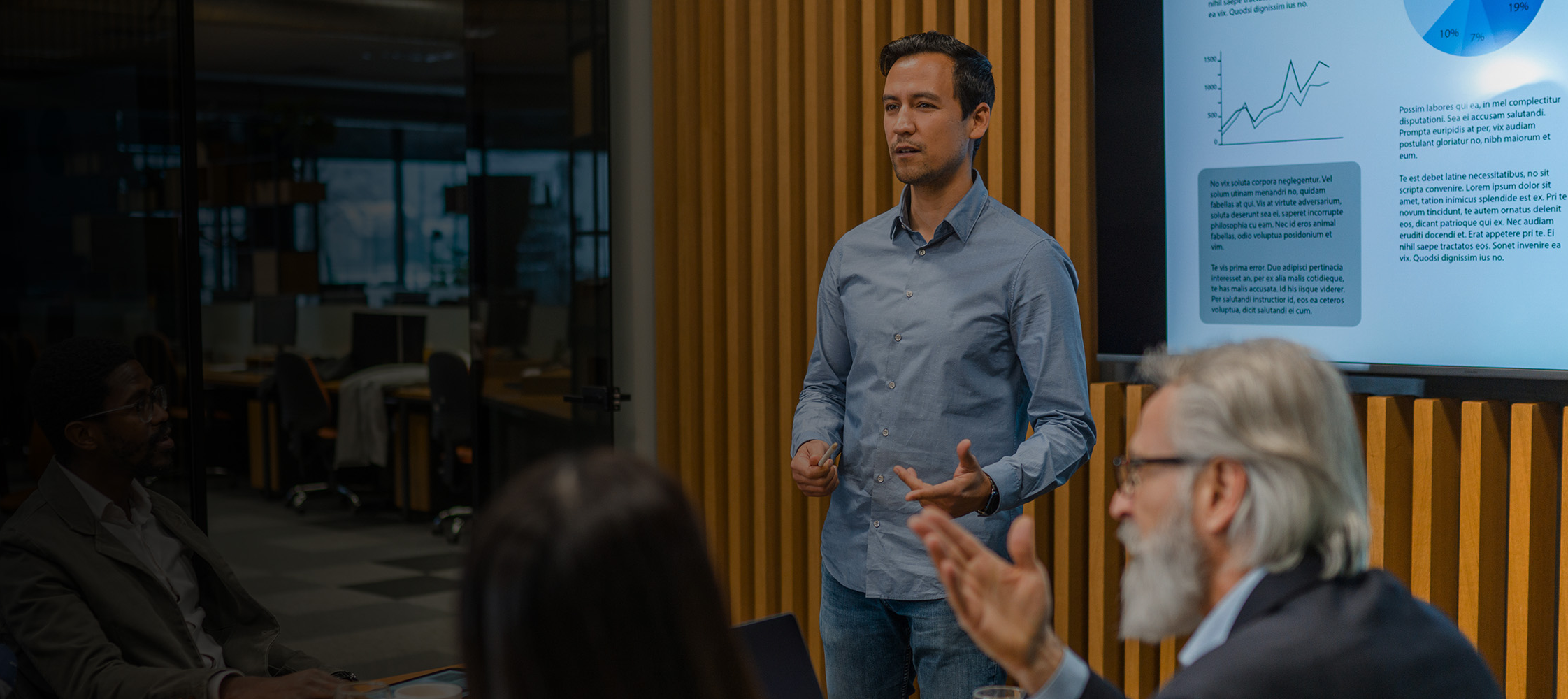 Man presenting to coworkers