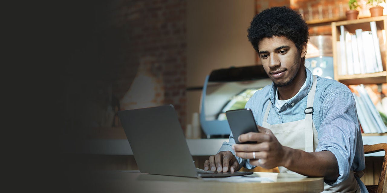 A man checking his phone