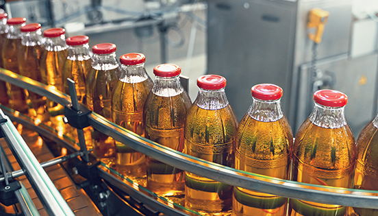 Image of drinks on a conveyor belt