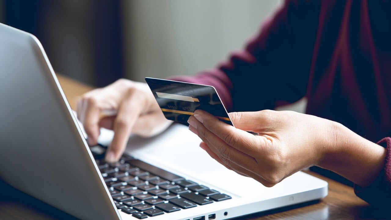 woman pay with card online