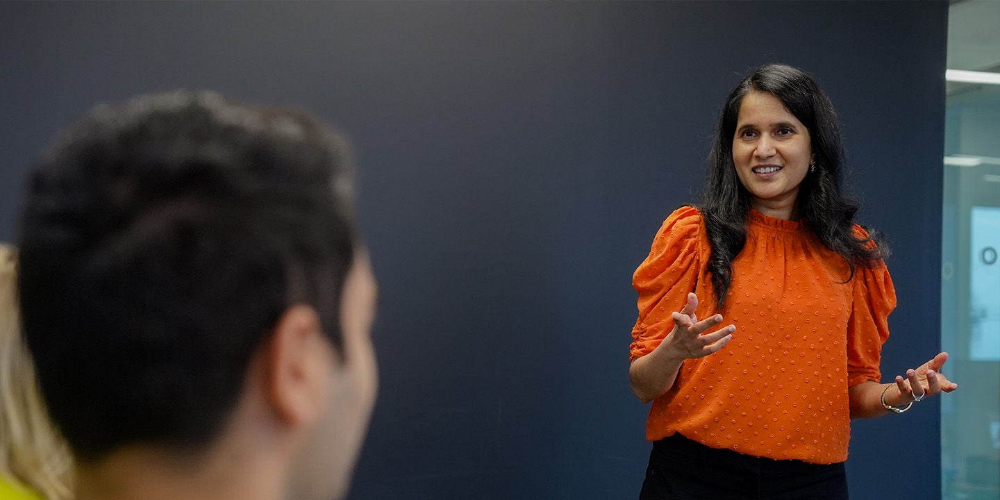 Woman presenting for an audience