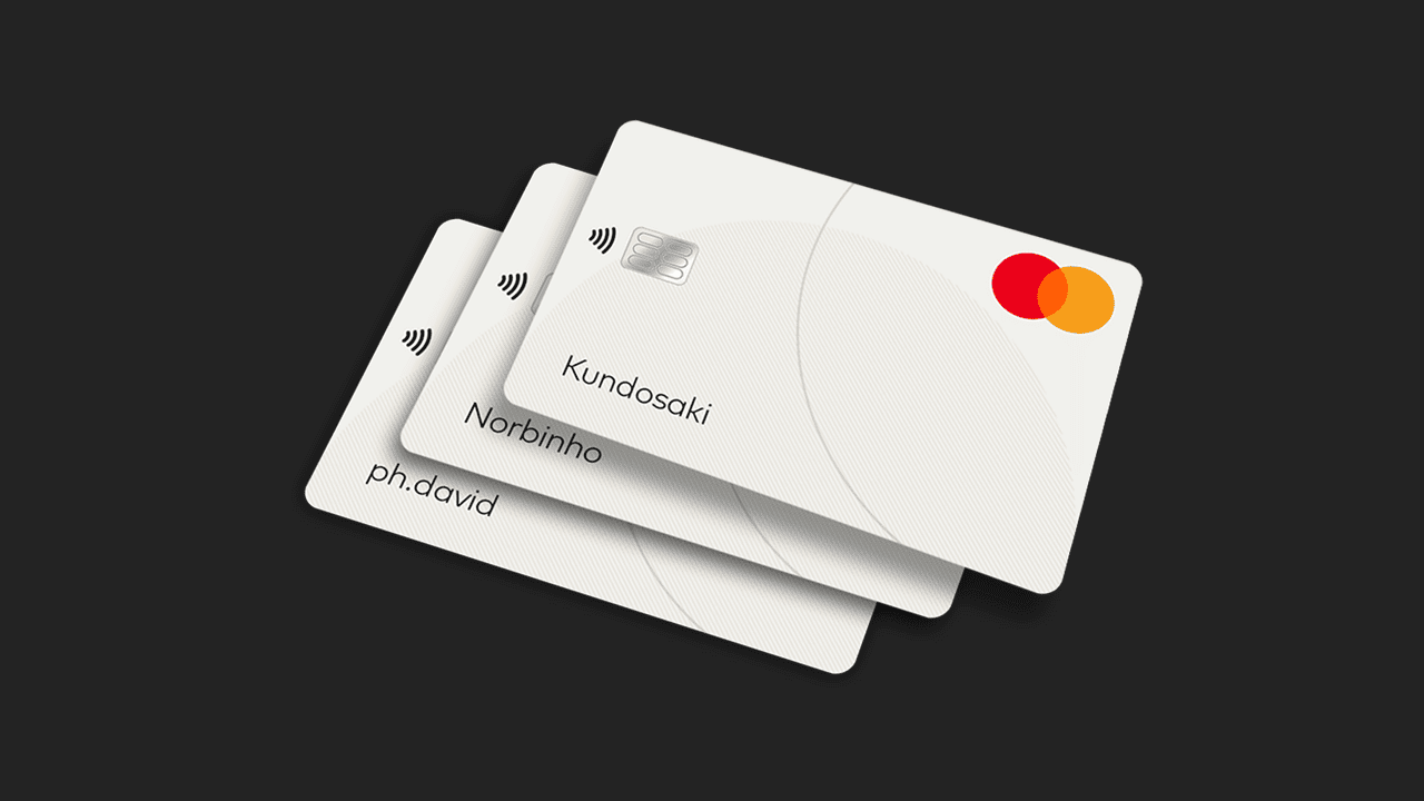 three stacked white mastercard cards