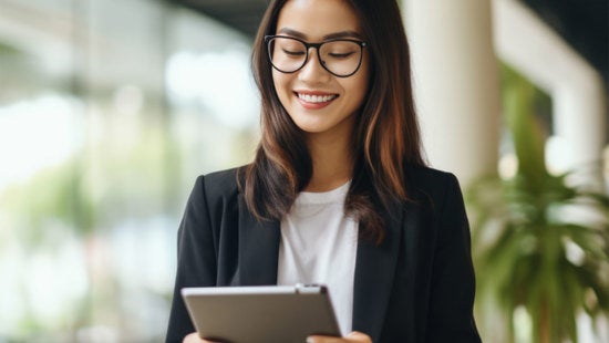 Woman looking at her tablet