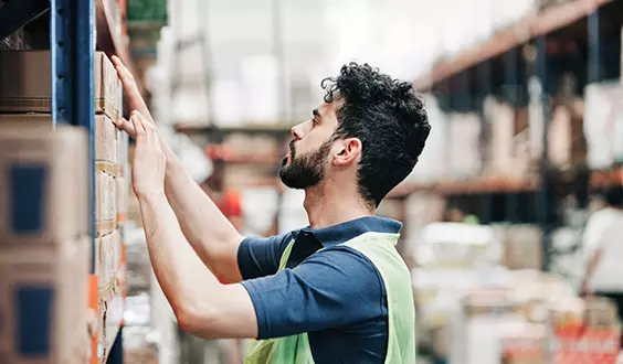 Pharmacist delivering medicine to a woman