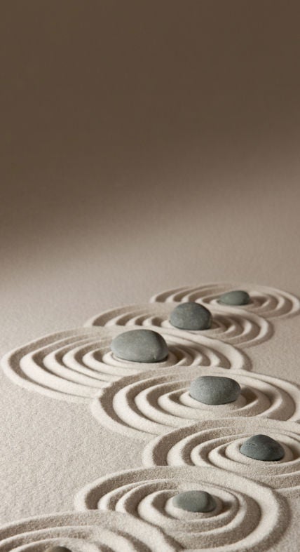 Stones in circles in the sand