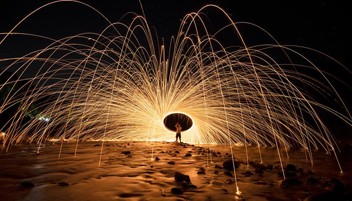 Man performing in the sand