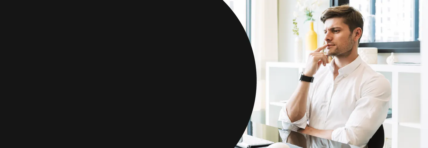 Man thinking on desk