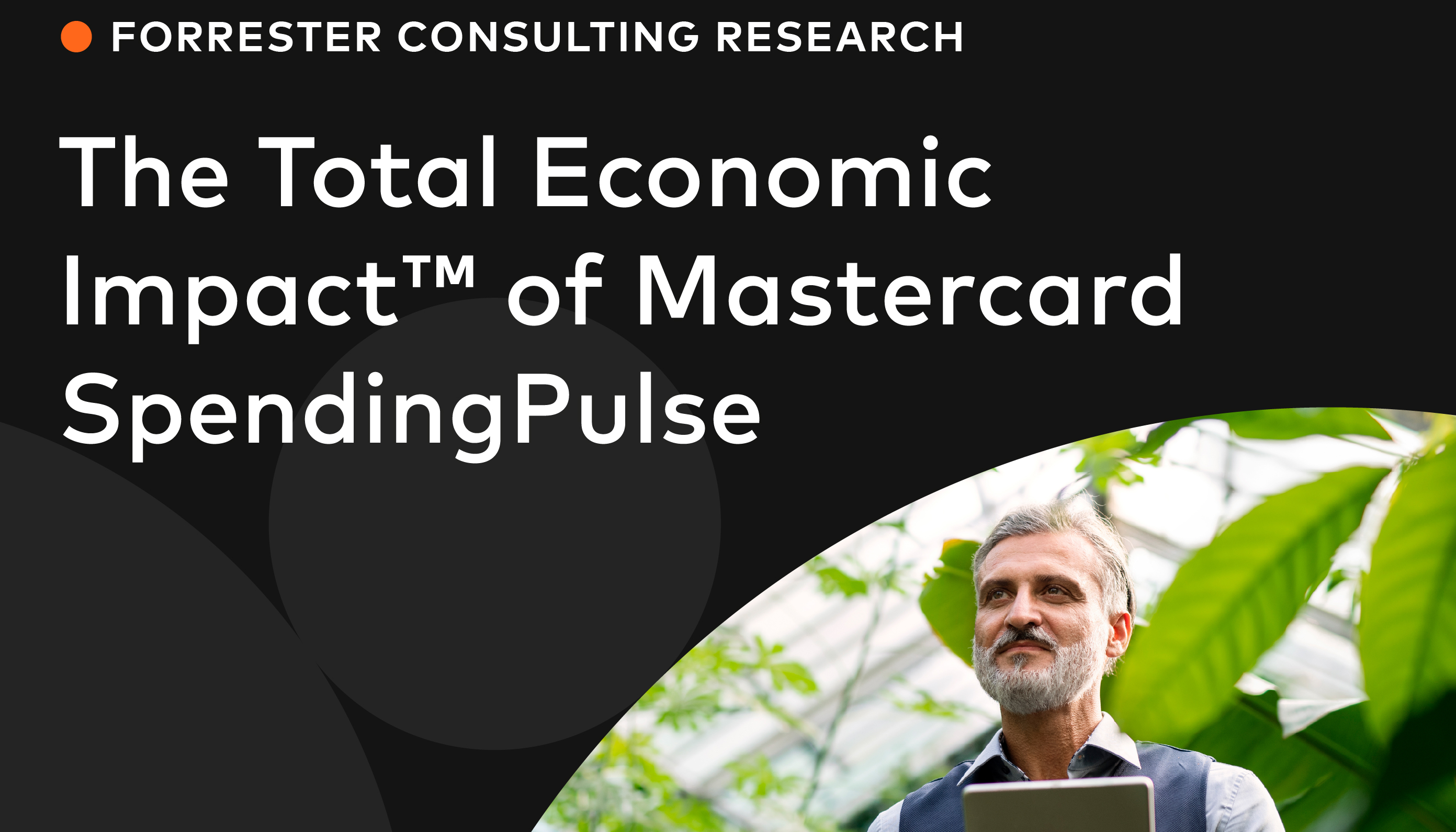 Man in front of leaves on a tablet