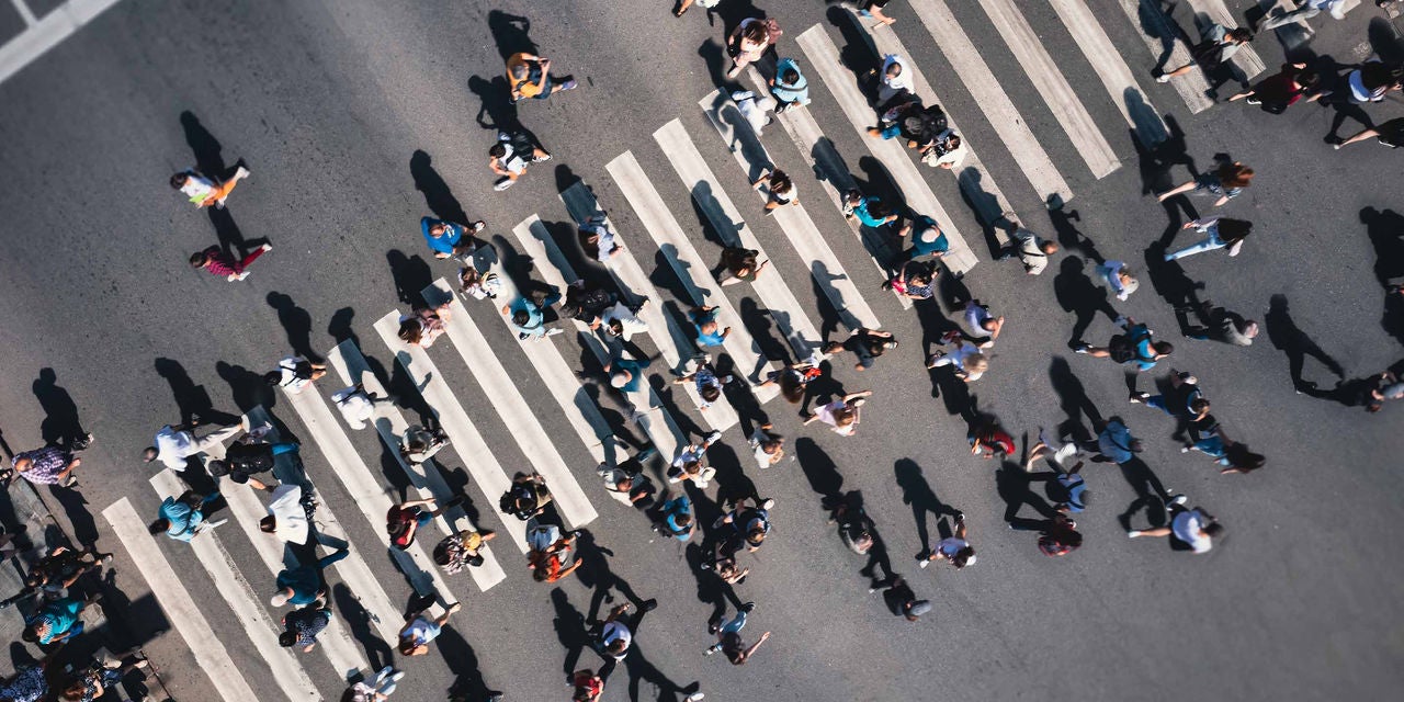 Group of people crossing the street