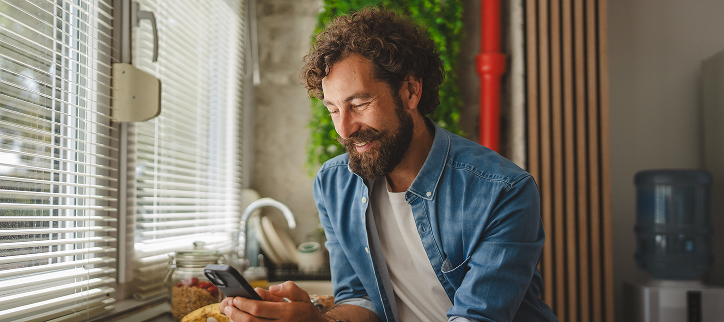 Man checking his email on his phone