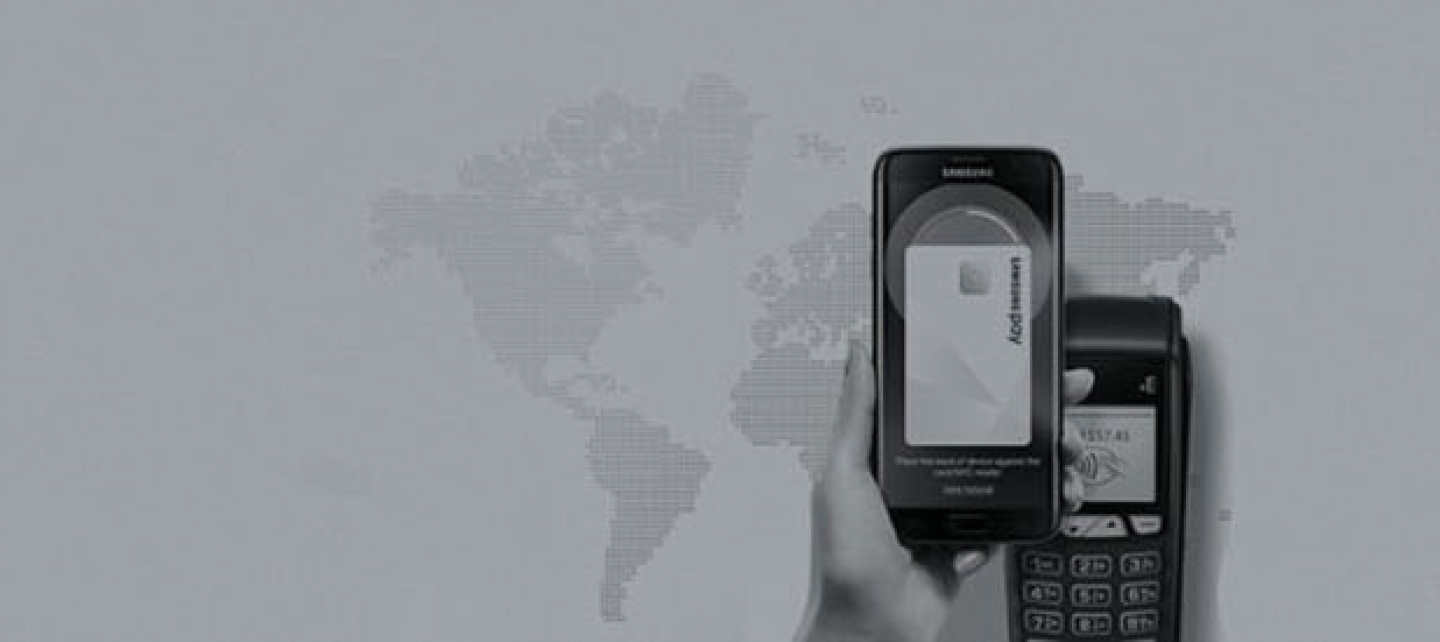 Phone with digital card on screen on top of payment terminal