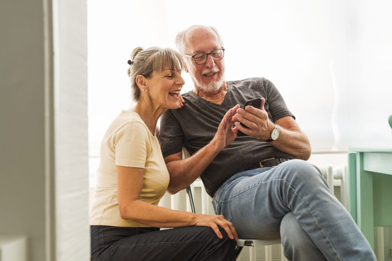 Older couple on phone