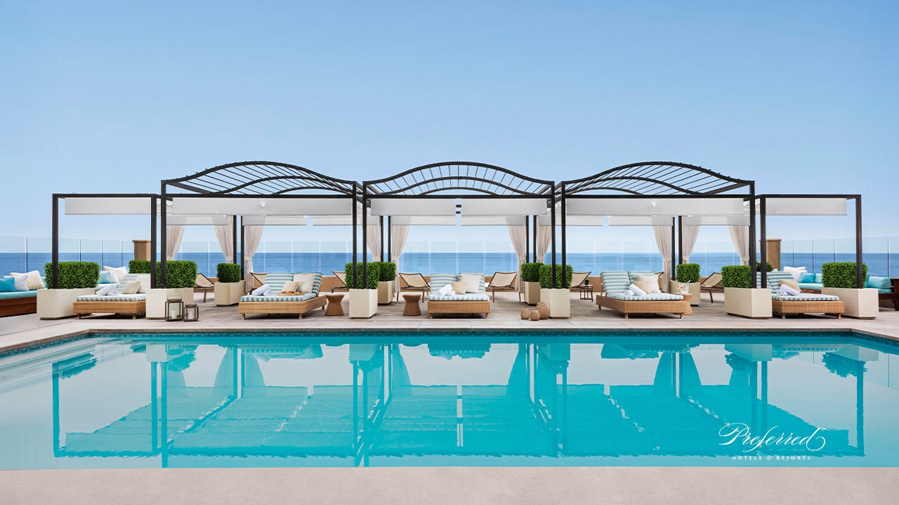 Location hotel con piscina a sfioro, vista mare