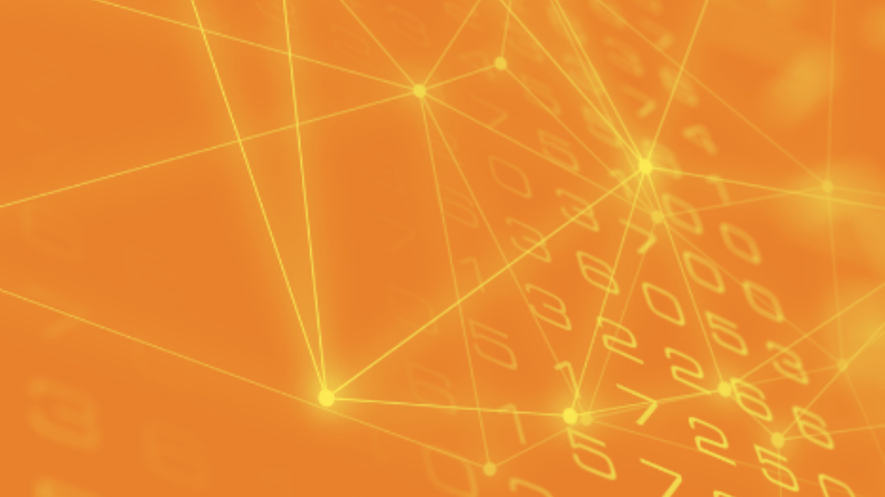 woman holding her hat facing a sunset