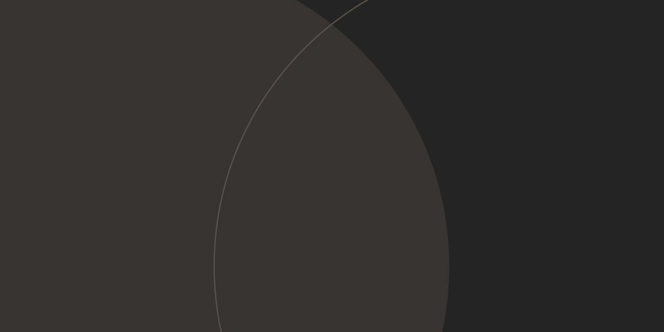 Two smiling people enjoying the benefits of being a Mastercard cardholder.