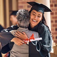 Young woman smiling while working on computer