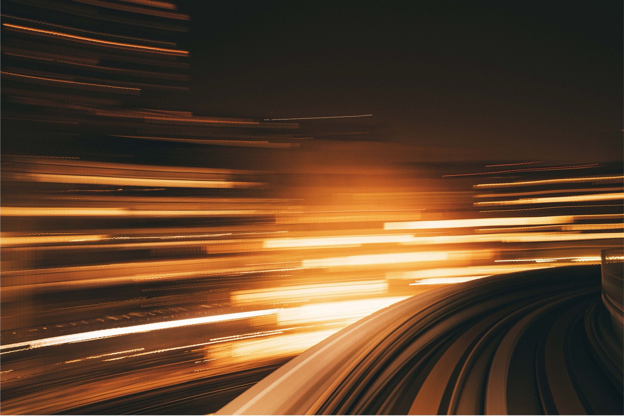 An abstract, high-speed view from a machine on a track, its motion illustrating forward-moving technology.